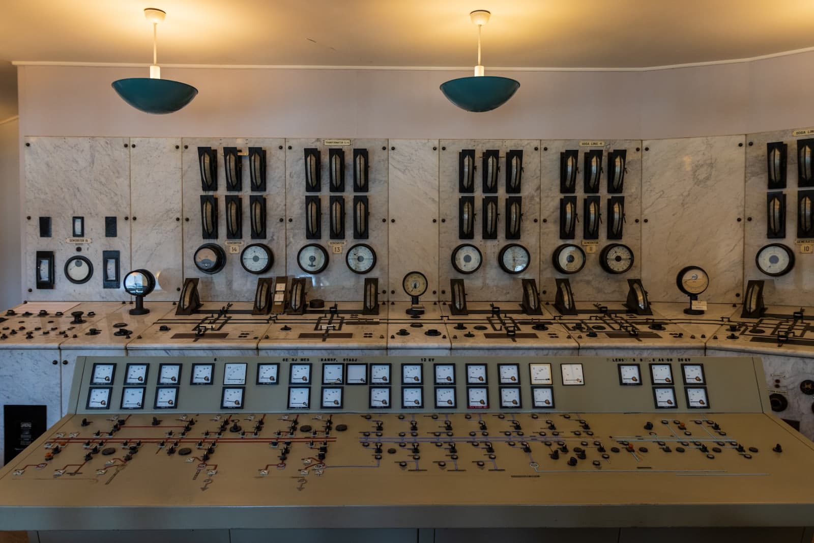 A large control room with lots of control knobs