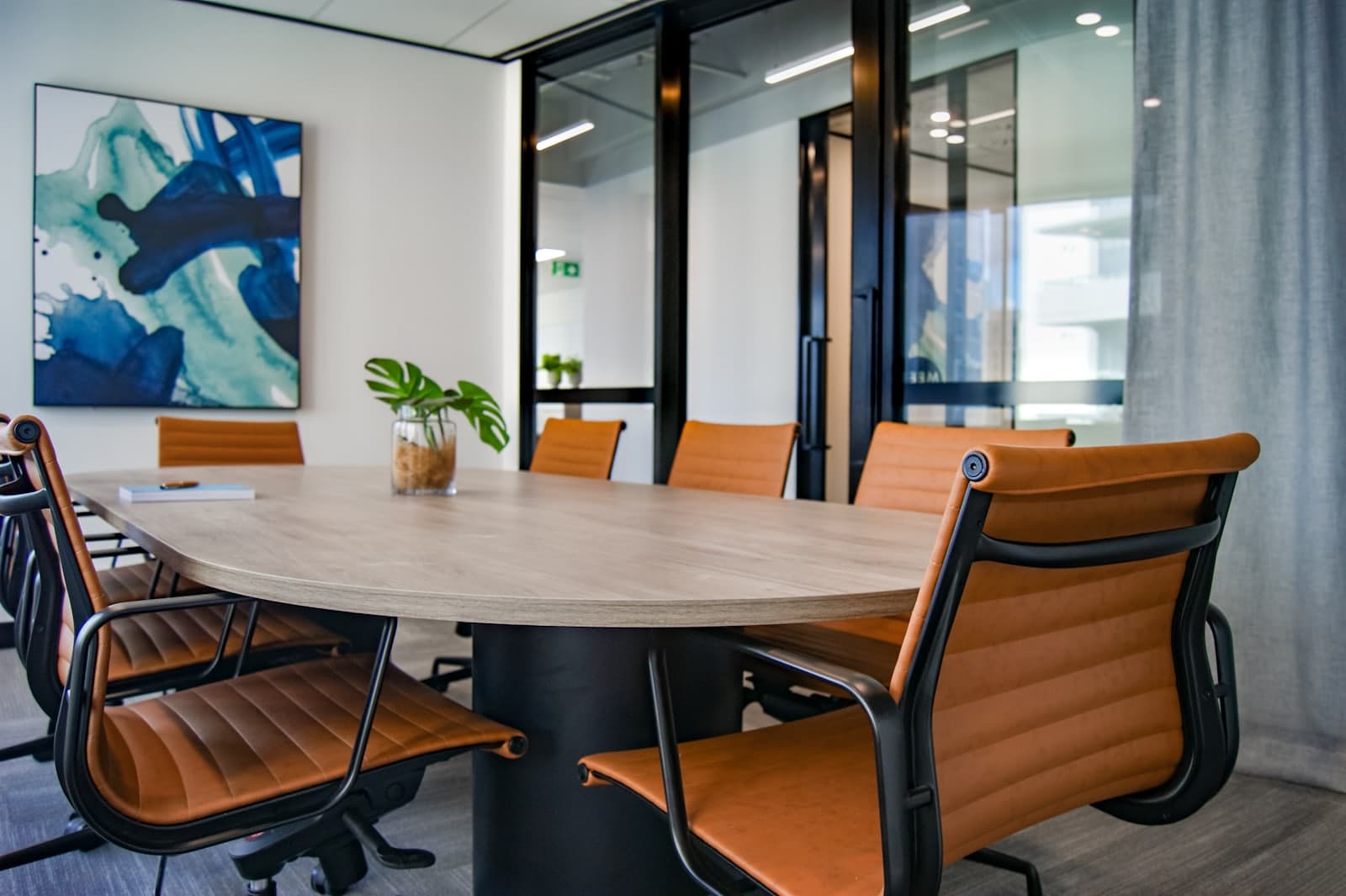 Brown wooden 9-piece office table and chairs
