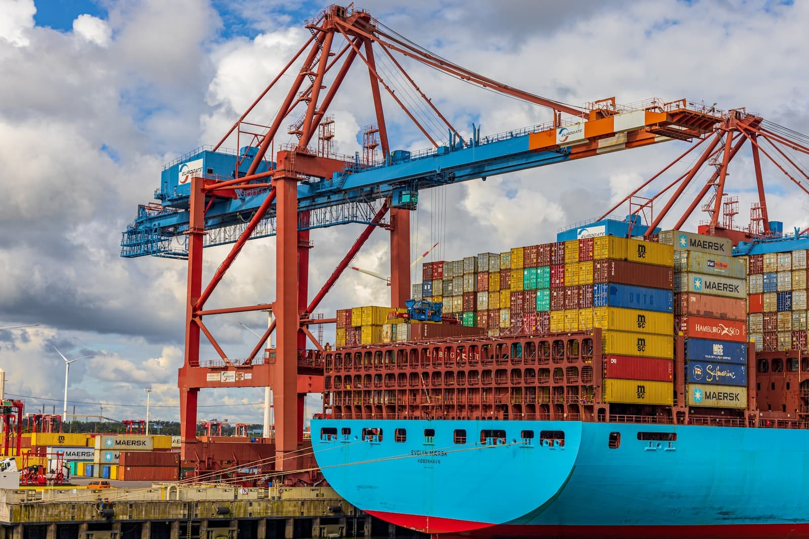 Blue and red cargo ship